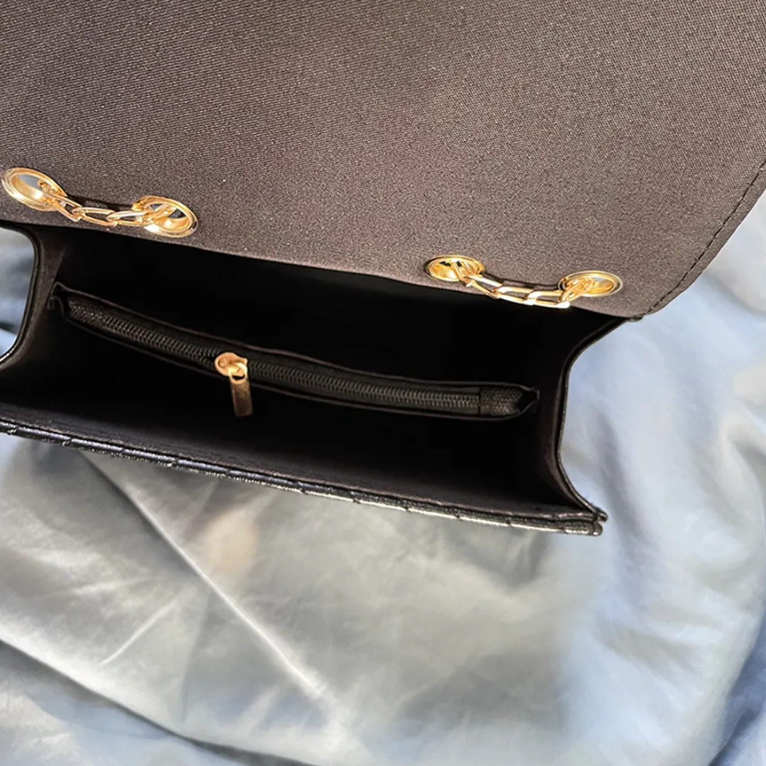 Liora Clutch – Elegant Handbag with Gold Accents