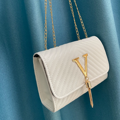 Liora Clutch – Elegant Handbag with Gold Accents