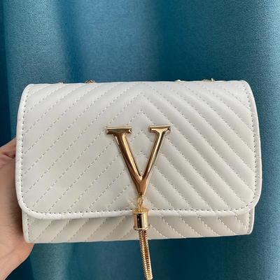 Liora Clutch – Elegant Handbag with Gold Accents