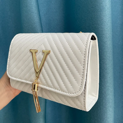 Liora Clutch – Elegant Handbag with Gold Accents