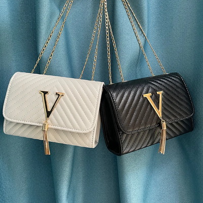 Liora Clutch – Elegant Handbag with Gold Accents