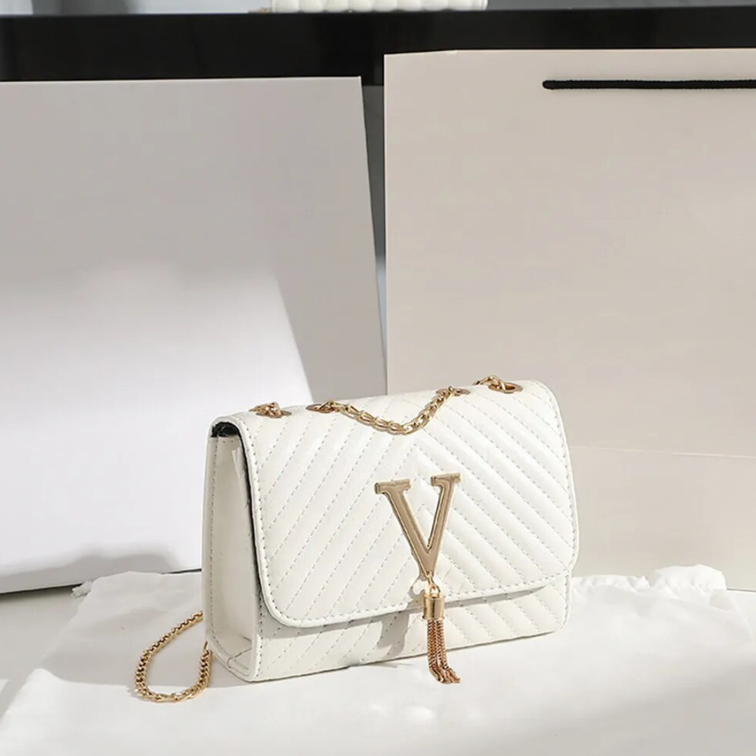 Liora Clutch – Elegant Handbag with Gold Accents
