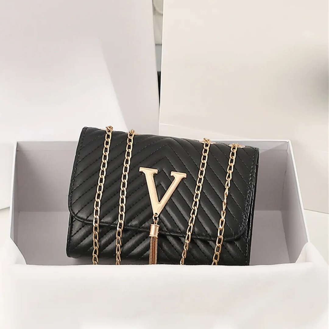 Liora Clutch – Elegant Handbag with Gold Accents