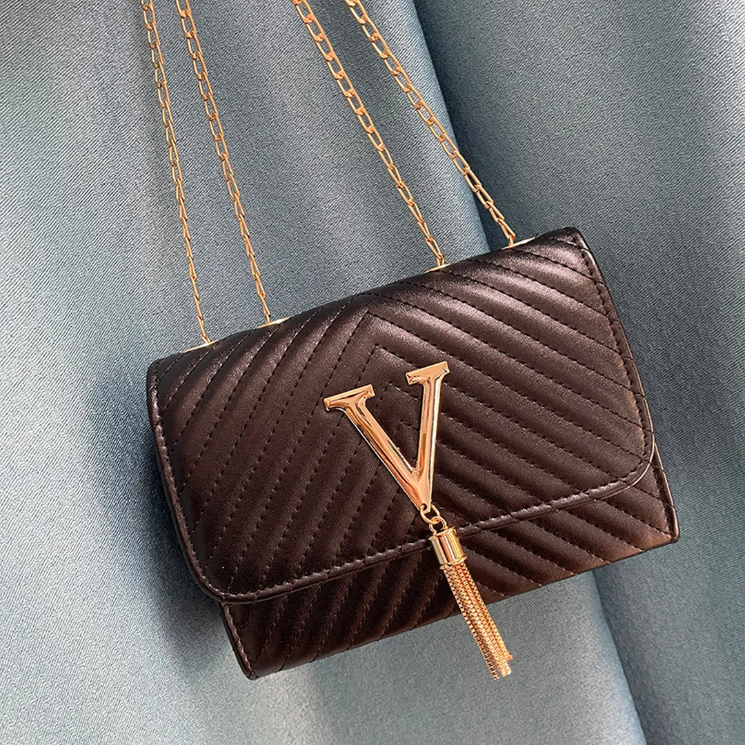 Liora Clutch – Elegant Handbag with Gold Accents