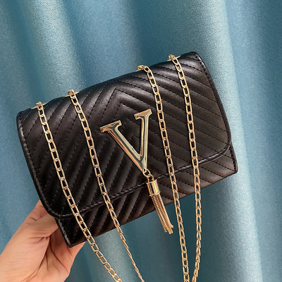 Liora Clutch – Elegant Handbag with Gold Accents
